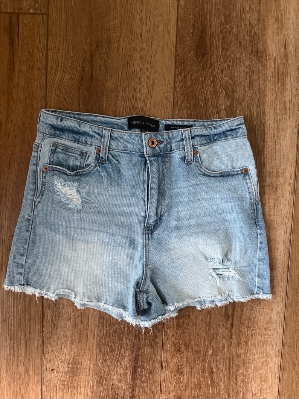 light wash distressed denim shorts